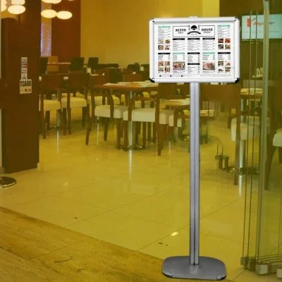 11x17 Adjustable Floor Menu Board & Floor Sign in front of a restaurant