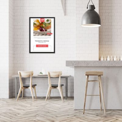 30x40 Snap Poster Frame with Today's Menu Hanging inside on a wall of a minimalist cafe