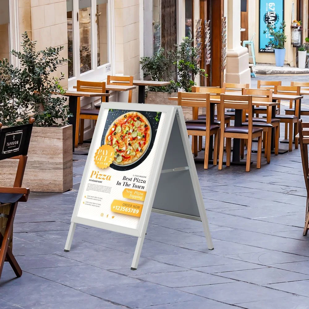 Slide in A Frame Board with silver frame outside of a restaurant
