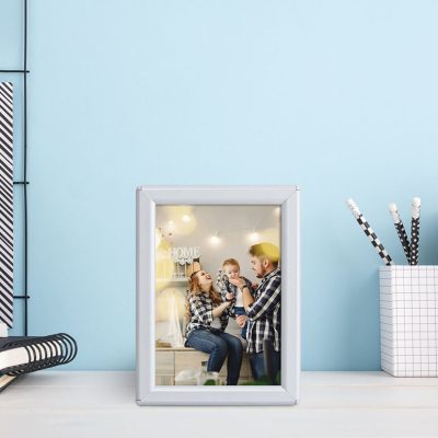 White Opti Frame with a picture of a family in it