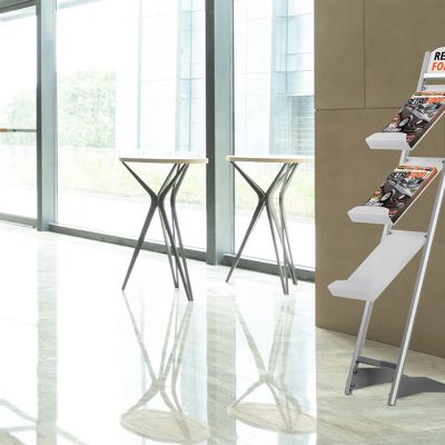 Three Tiered brochure stand in the lobby of a hotel