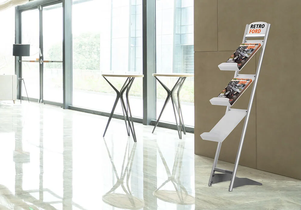 Rapid Brochure Set 3 x A4 copy Three Tiered brochure stand in the lobby of a hotel