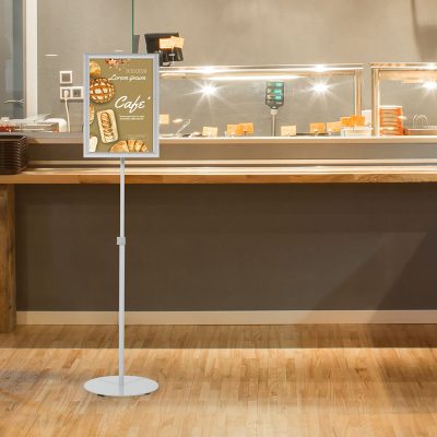 Floor Sign Stand Holder with height adjustable in front a deli desk