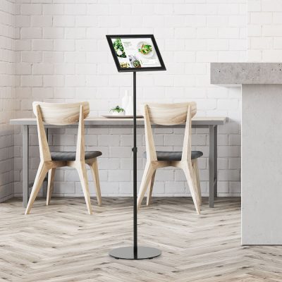 Landscape Adjustable Floor sign stand holder in a minimalist cafe