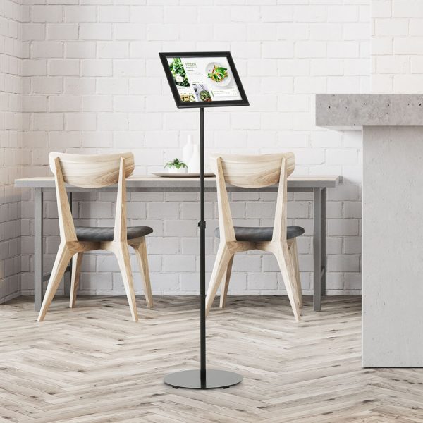 Landscape Adjustable Floor sign stand holder in a minimalist cafe