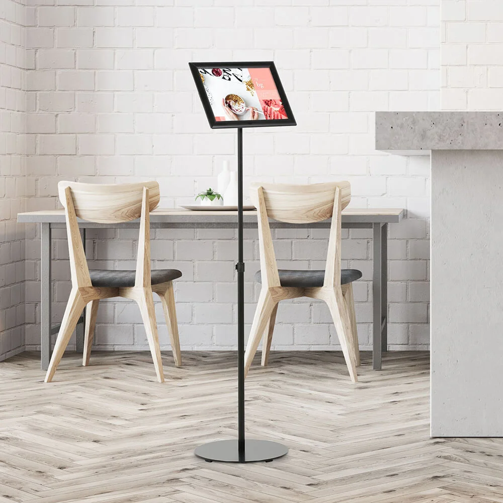 floor-sign-stand-holder-with Landscape Adjustable Floor sign stand holder in a minimalist cafe