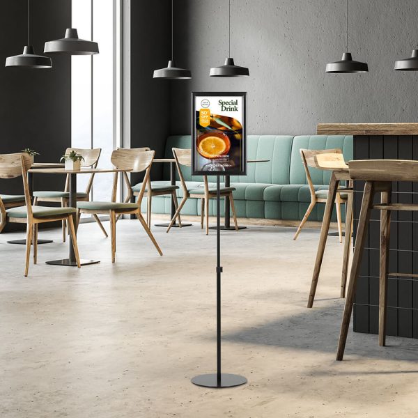 Adjustable Floor Sign Stand holder in a restaurant