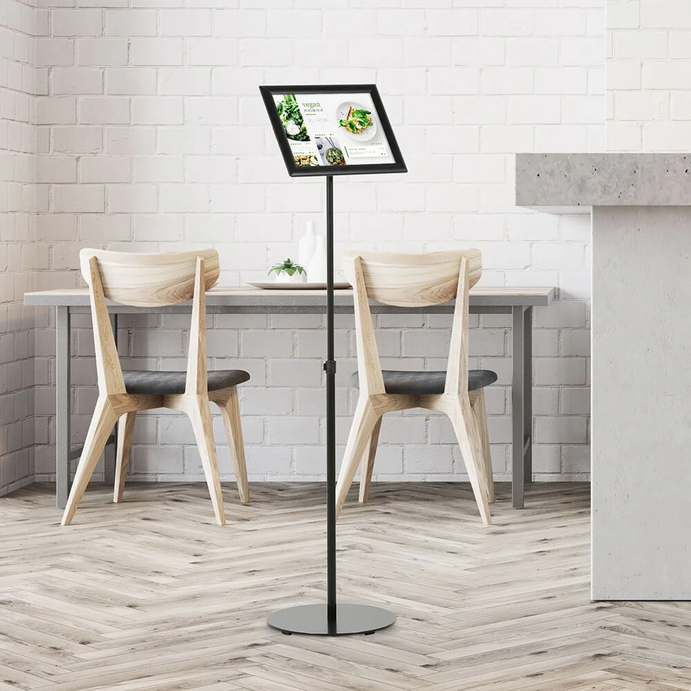 floor-sign-stand-holder Landscape Adjustable Floor sign stand holder in a minimalist cafe