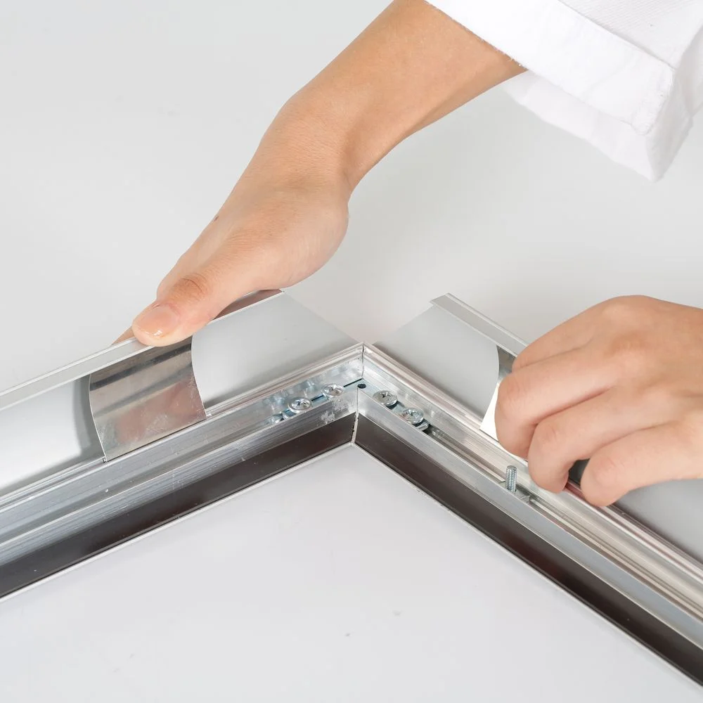Portable 1.77 Snap Frame, mitred, 27x40, silver, white backing, clear cover-5 Portable 1.77 Snap Frame, mitred, 27x40, silver, white backing, clear cover-5