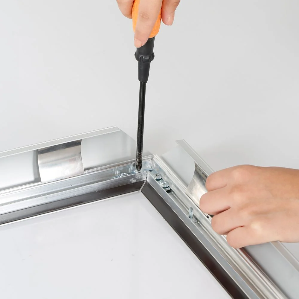 Portable 1.77 Snap Frame, mitred, 27x40, silver, white backing, clear cover-6 Portable 1.77 Snap Frame, mitred, 27x40, silver, white backing, clear cover-6