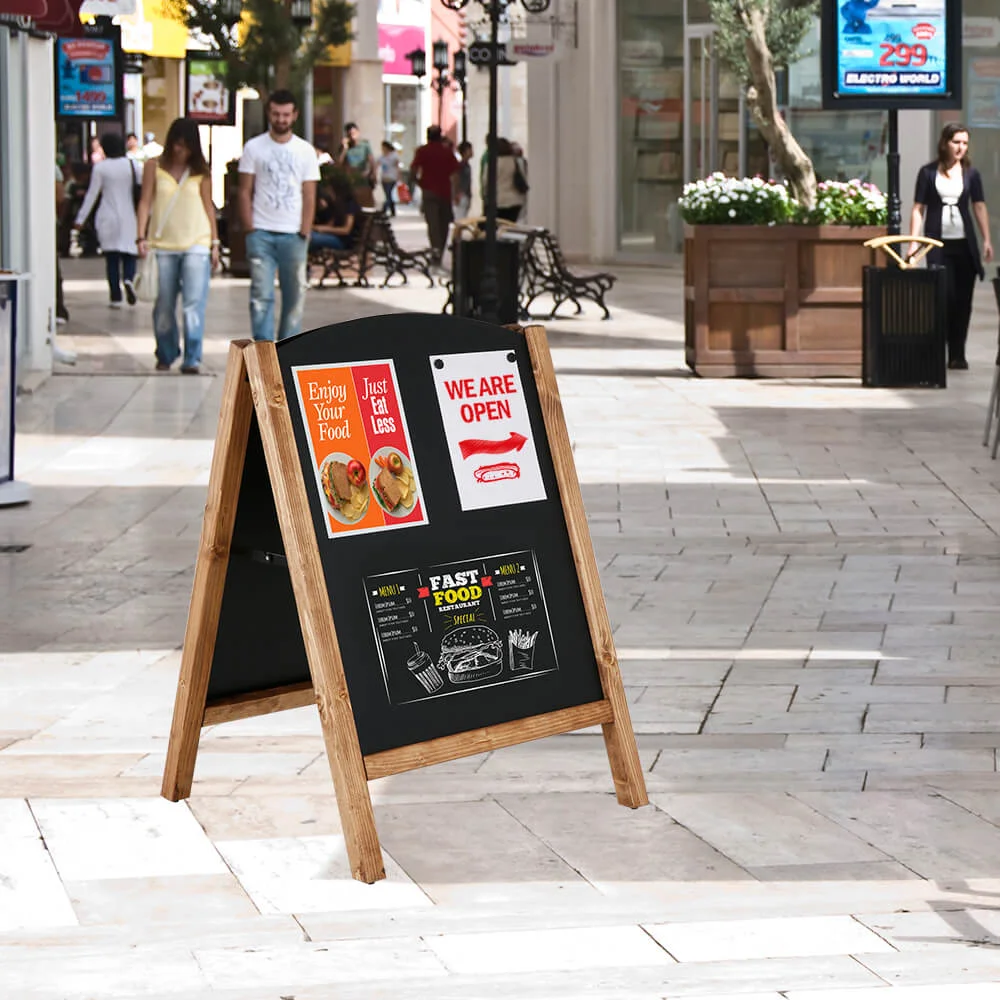 23-6-x-30-70-timber-chalk-board Timber Chalk Board advertising an open restaurant in the middle of the shopping center