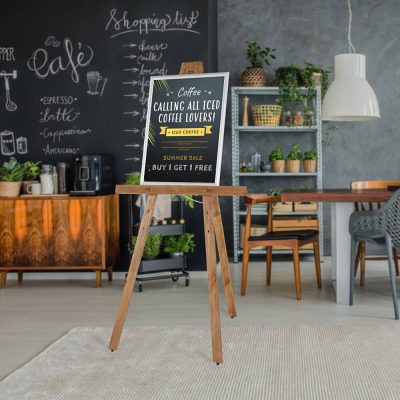 Basic easel holding a poster about a coffee sale in a coffee shop