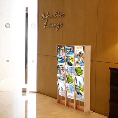 Wood magazine rack in the lounge area of a hotel