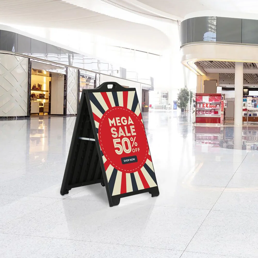SignPro Poster Mega Sale advertised in a shopping mall on a SignPro Sidewalk Sign A-Board