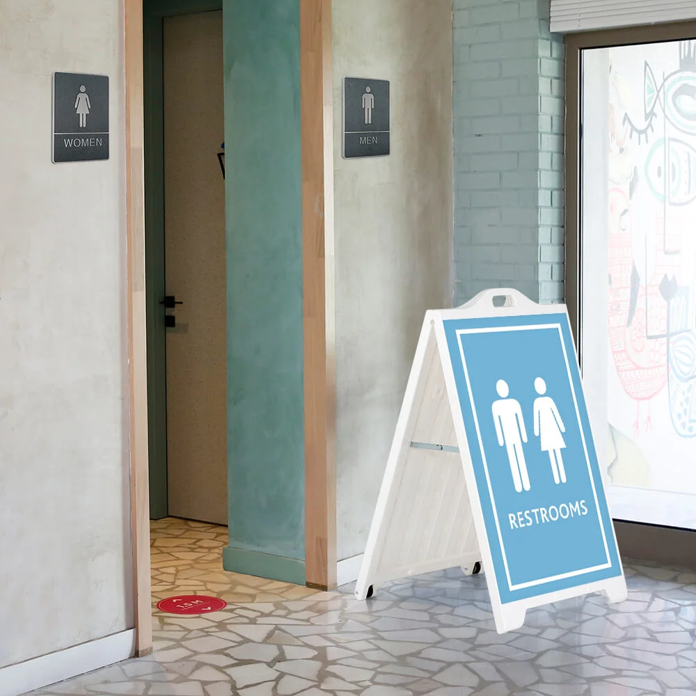 signpro-sidewalk-sign Restroom sign on a SignPro Sidewalk sign outside of the restrooms in a cafe