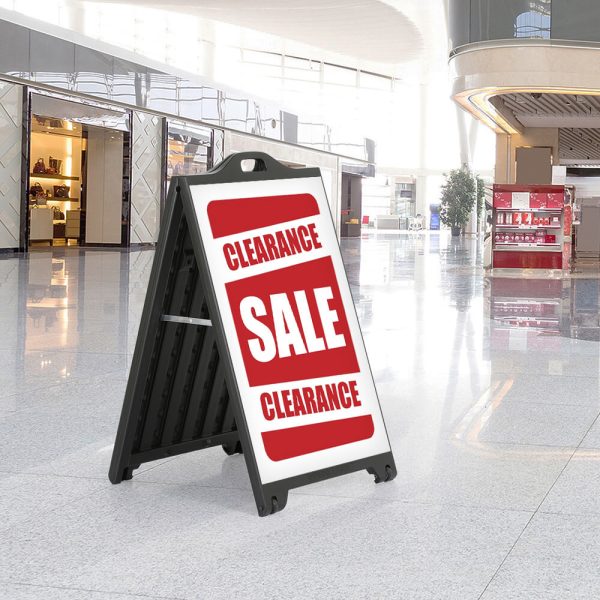 Clearance sale on a SignPro sidewalk Sign in the middle of a shopping mall