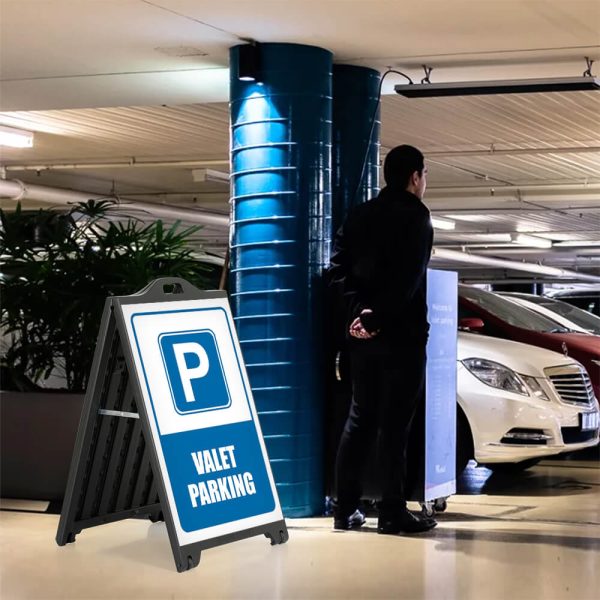 Valet parking sign on a Black A-Frame SignPro Sidewalk Sign in a parking garage next to the valet