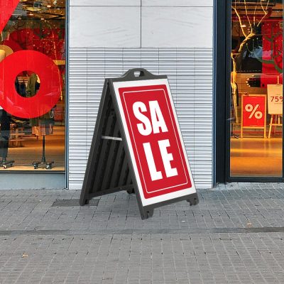 Sale Poster on a Black SignPro sidewalk sign outside of a clothing shop