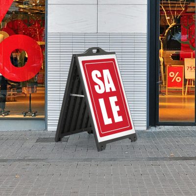Sale Poster on a Black SignPro sidewalk sign outside of a clothing shop