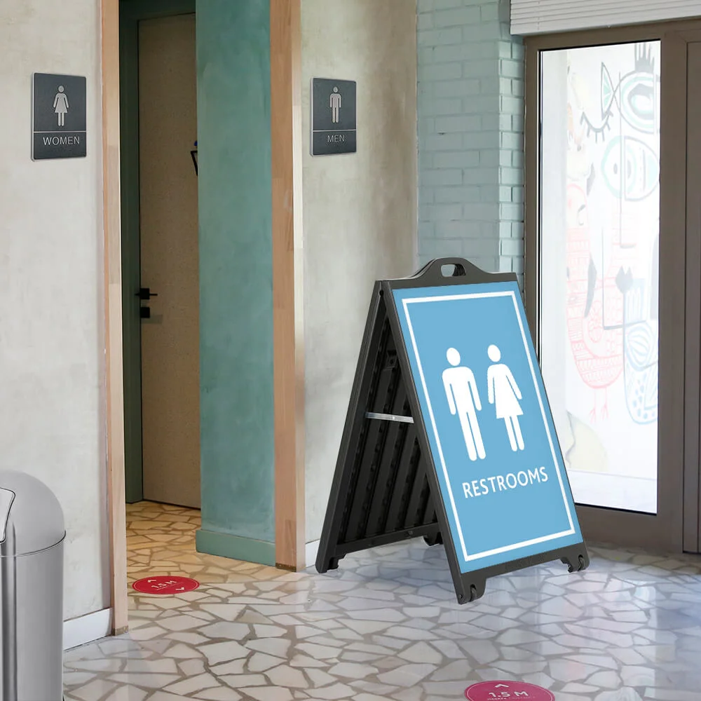 signpro-sidewalk-sign A SighPro Black A-Board outside alerting where the restrooms are outside of said restrooms