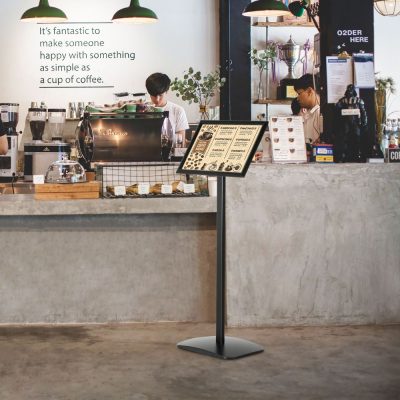 Restaurant menu on a Reusable aluminum sign post in a coffee shop