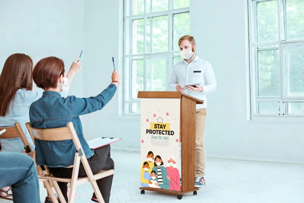 Wood Podium Man giving a speech to a very eager crowd behind a wooden podium