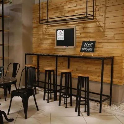 Desktop mini Easel holding a chalk board on the tables in a restaurant