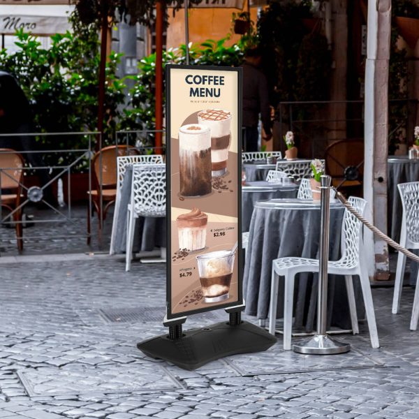 Outdoor WindPro Sidewalk Sign next to outdoor seating at a coffee shop