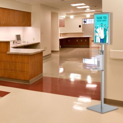 Floor Standing Hand Sanitizer Dispenser with Opti Frame in the hallway of a hospital