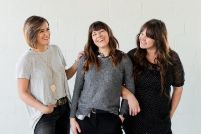 three women laughing