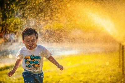 child playing in water