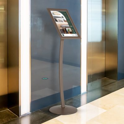 large earth colored floor standing menu board in a restaurant