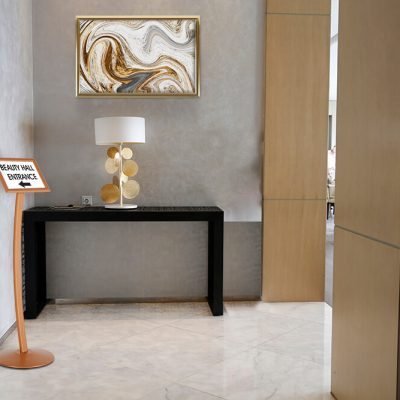 Copper Pedestal Sign Holder displaying where the Beauty Hall is in an event center