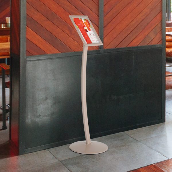 Pale rose floor standing menu board in a restaurant