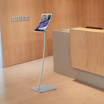 Arc Menu Board with magnetic frame in front of the check-in desk at a hotel