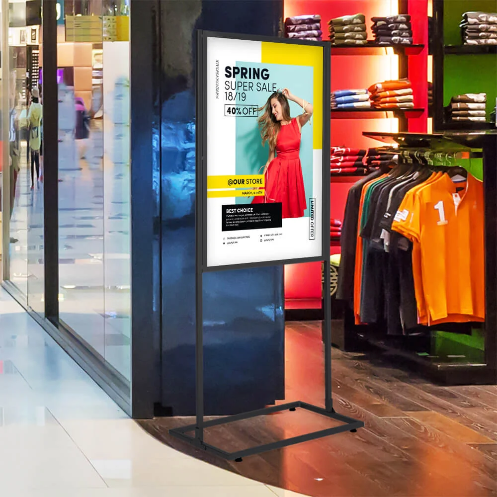 24w-x-36h-metal-eco-infoboard single tiered black metal eco infoboard in a menswear shop