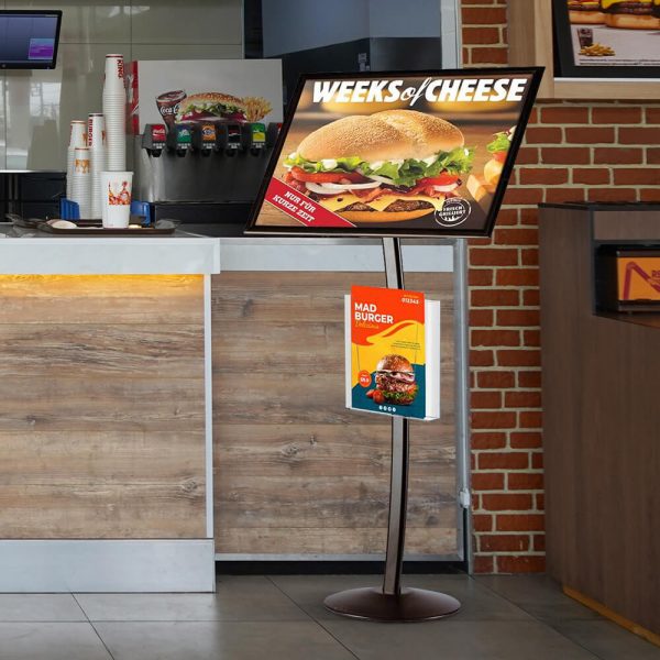 A large menu board on the customer side of the counter at a restaurant