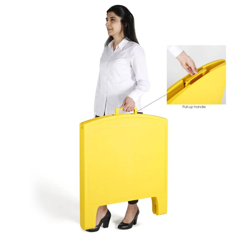 sandwich-board-a-frame-double-sided-outdoor-sidewalk-sign-holder-24-80x19-76-yellow (2) A woman carrying the yellow sandwich board sidewalk sign by its handle at the top