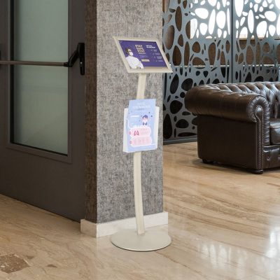 pedestal sign holder in the lobby area of a hotel