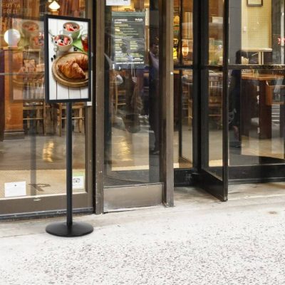 Pedestal Sign holder Stand outside of a cafe