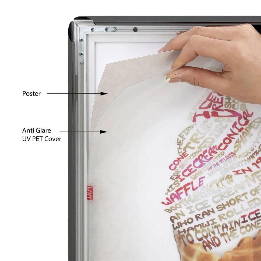 buy-max-ledbox-25mm-27x40-black (4) A woman showing the protective layer that goes over your poster in the LED Light Snap Poster Frame